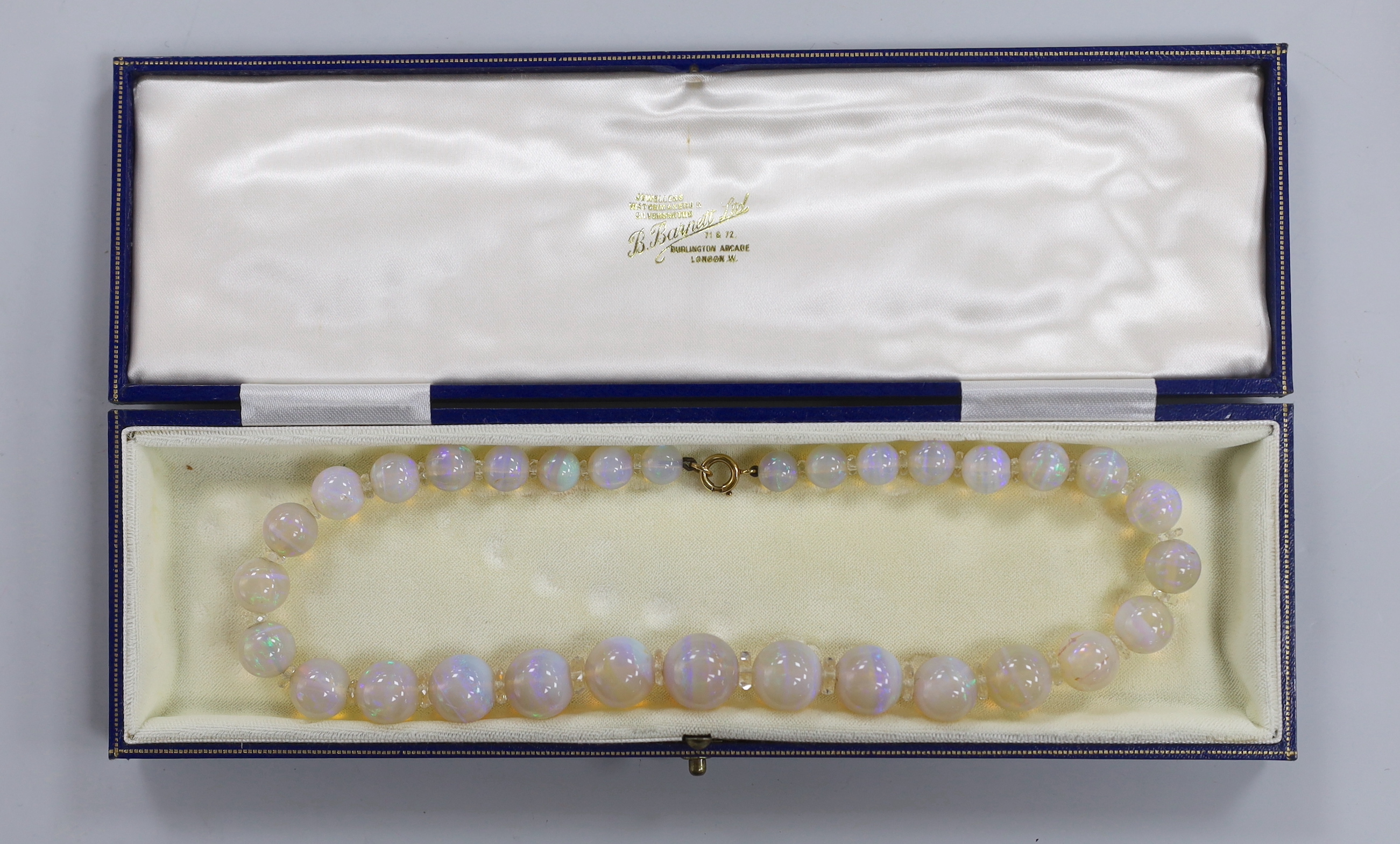 A single strand graduated translucent opal bead necklace, 38cm.